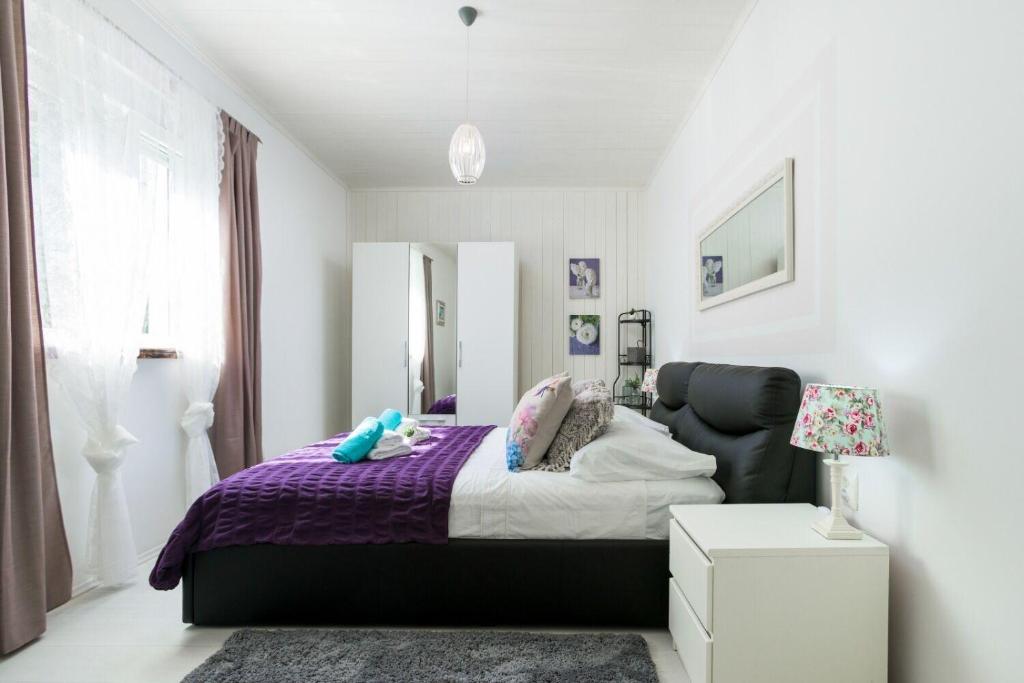 Postel nebo postele na pokoji v ubytování Apartment Jurica