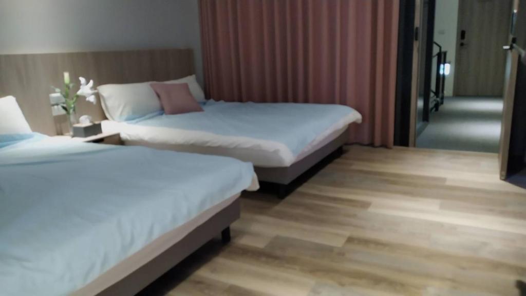 Letto o letti in una camera di 蘆思特六合民宿