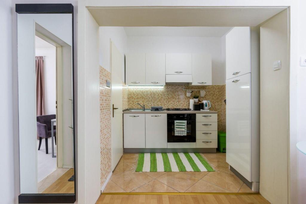 Kuchyň nebo kuchyňský kout v ubytování Apartment Jurica