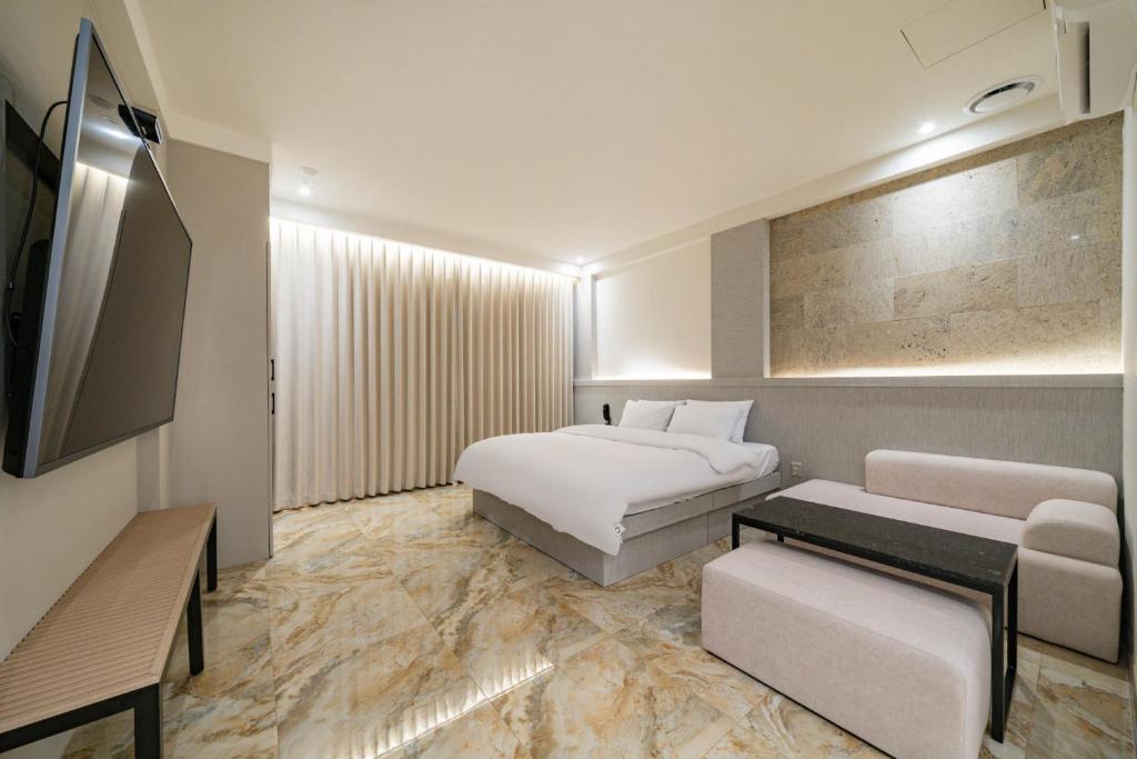 TV a/nebo společenská místnost v ubytování Hotel THE ART UIWANG