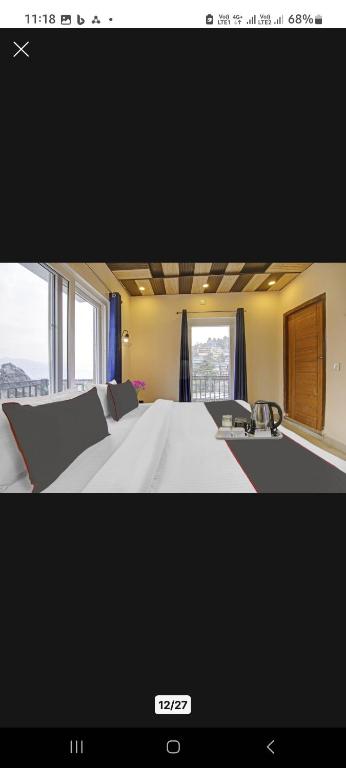 Postel nebo postele na pokoji v ubytování Himalayan view stay - Pahado wala ghar
