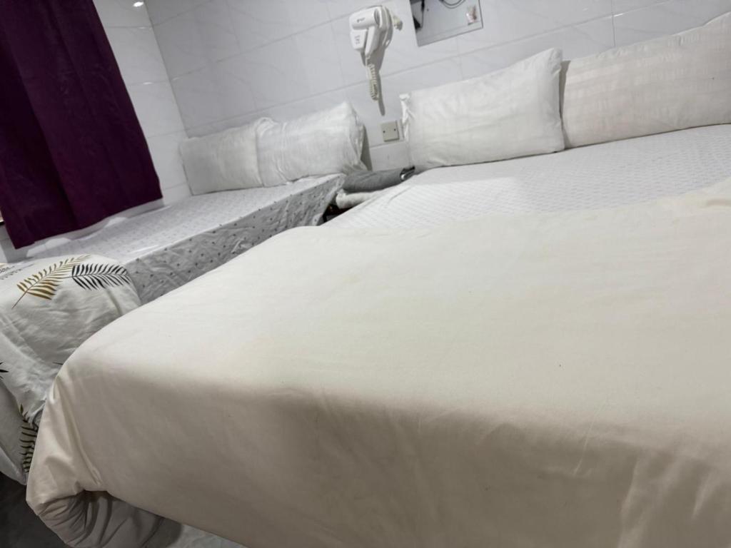 Postel nebo postele na pokoji v ubytování Relaince international hostel