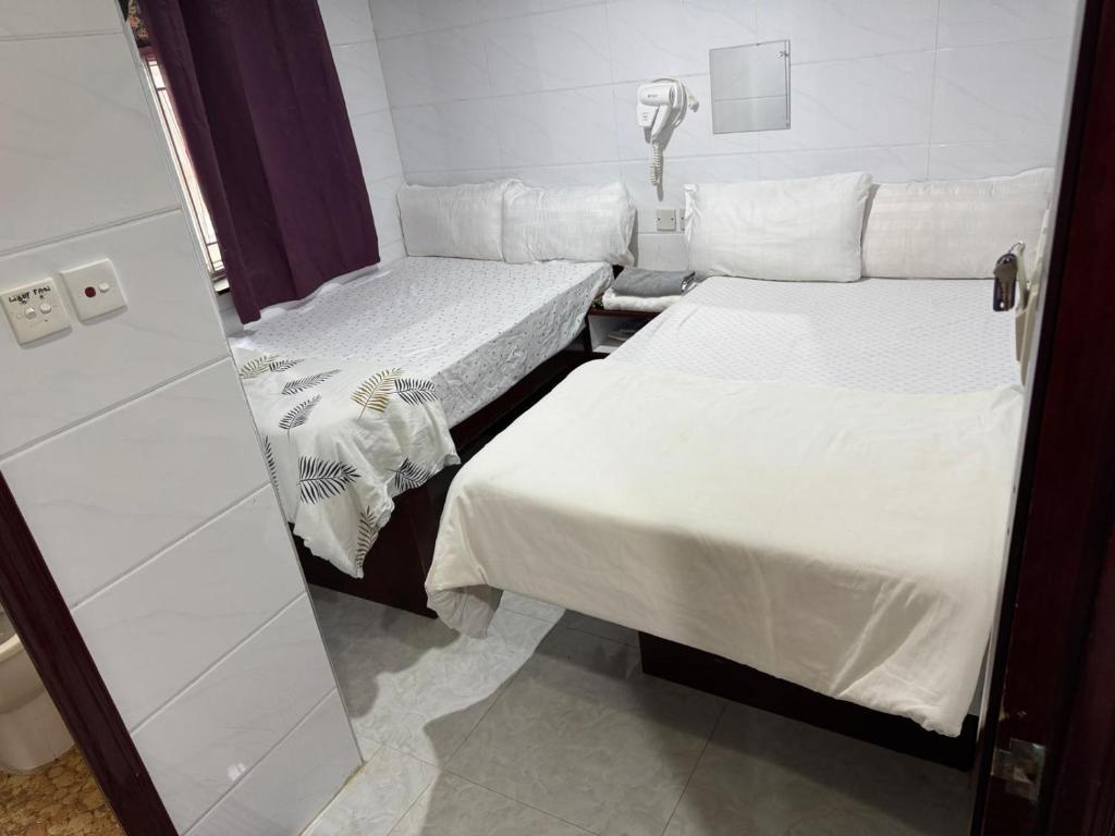 Postel nebo postele na pokoji v ubytování Relaince international hostel