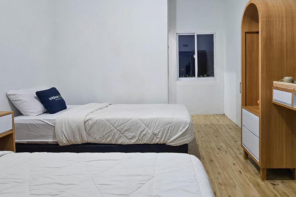 Urbanview Orchid Guest House - Habitación Doble Deluxe