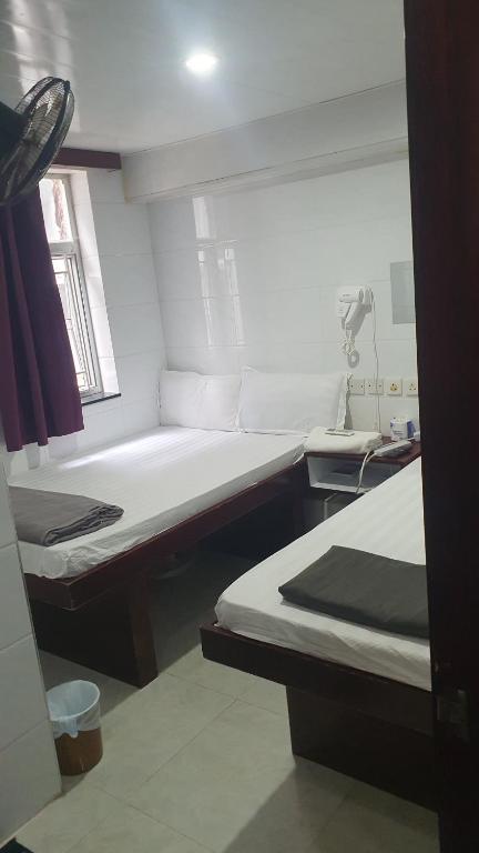 Postel nebo postele na pokoji v ubytování Relaince international hostel
