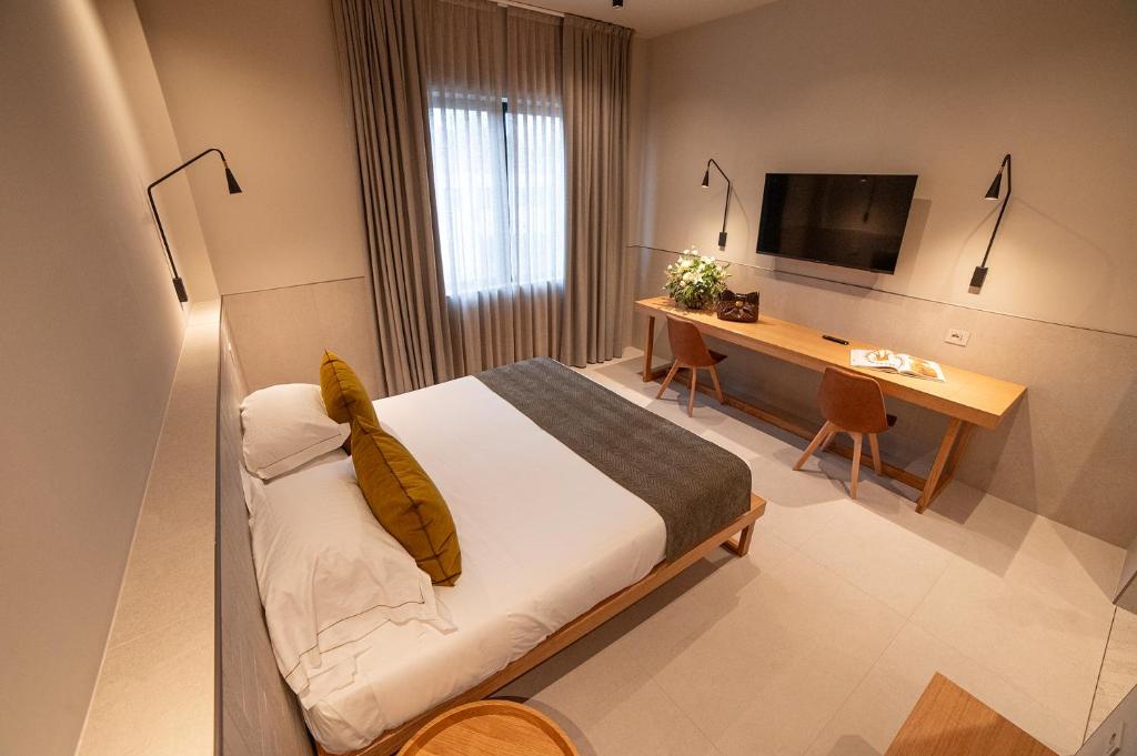 TV a/nebo společenská místnost v ubytování Hotel Leopardi