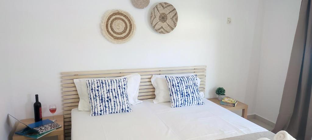 Postel nebo postele na pokoji v ubytování ILIDA apartments