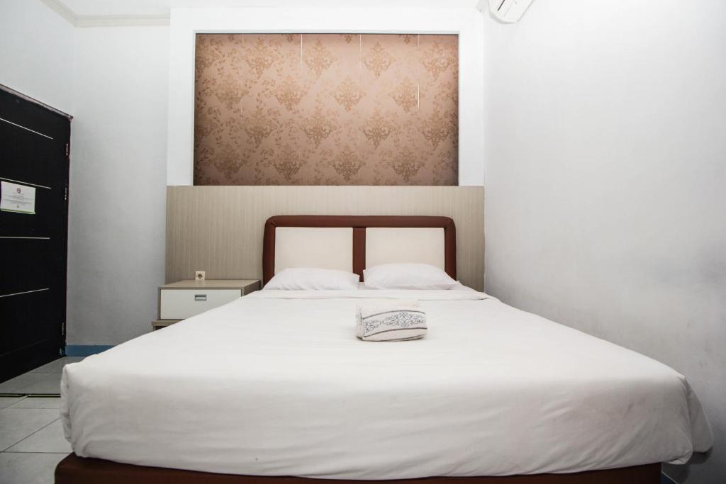 Postel nebo postele na pokoji v ubytování Allisa Resort Hotel