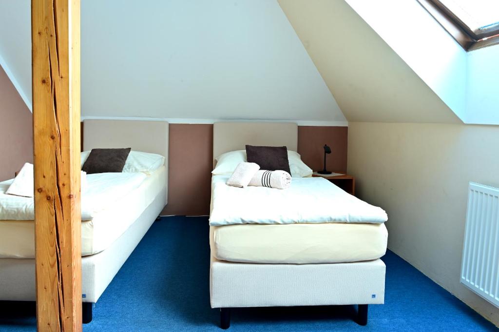 Postel nebo postele na pokoji v ubytování Hotel Classic