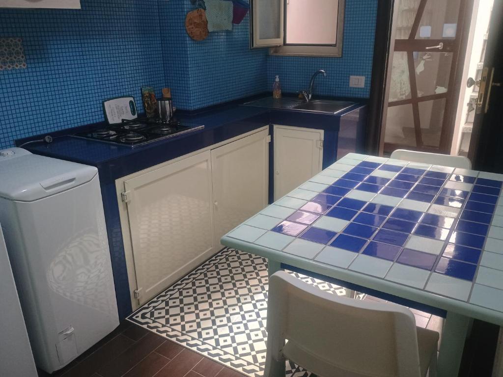 Kuchyň nebo kuchyňský kout v ubytování Terrazza Sui Sassi