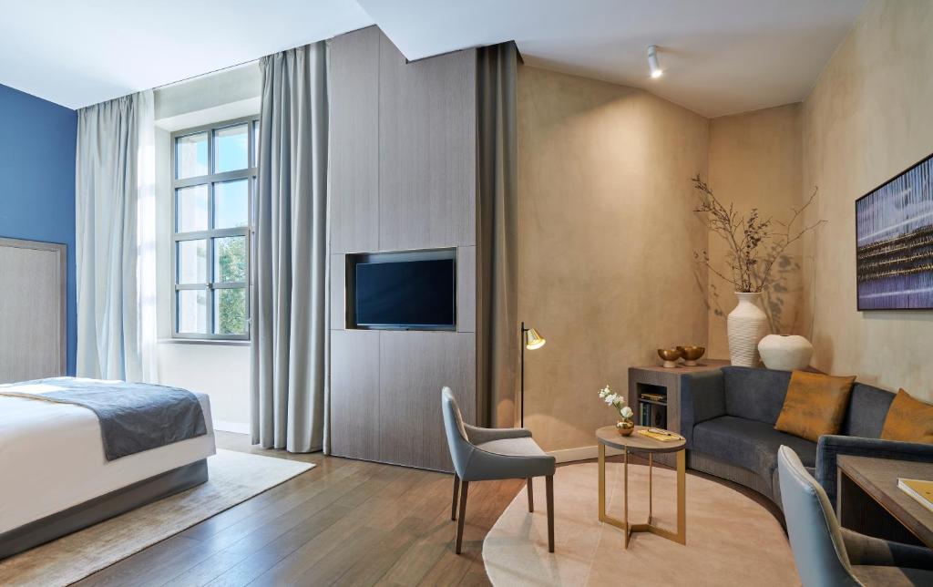 TV a/nebo společenská místnost v ubytování InterContinental Lyon - Hotel Dieu by IHG