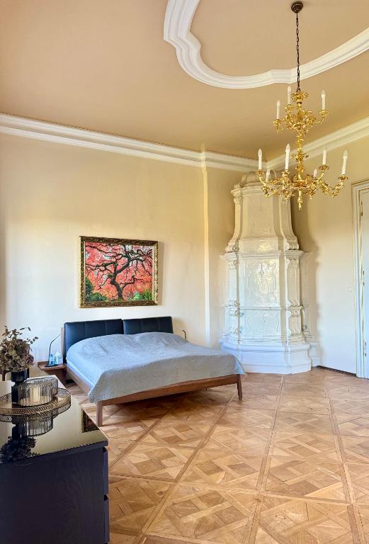 Postel nebo postele na pokoji v ubytování Schloss Welsdorf