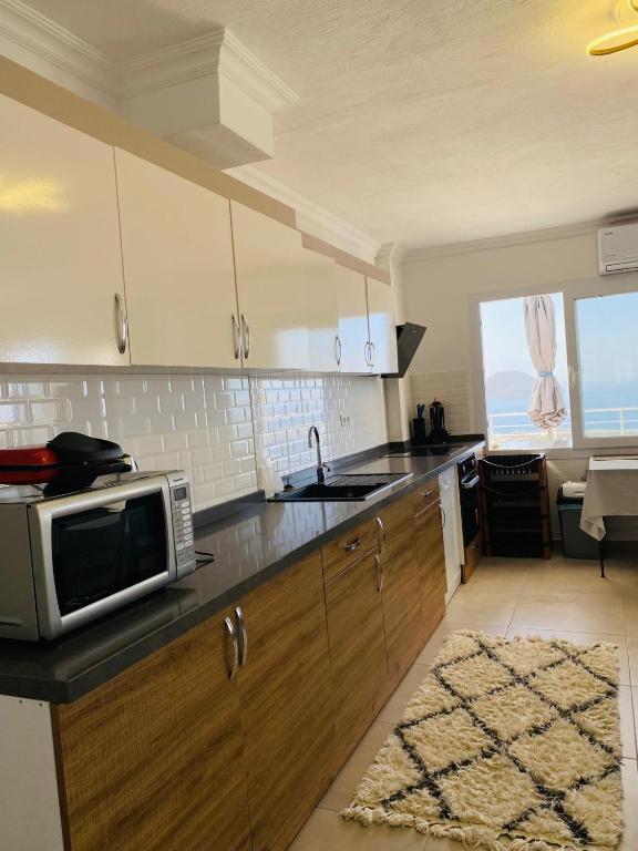 A kitchen or kitchenette at Bodrum eaSon Villa & House 350m2 Full Sea View with Private Infinity Pool
