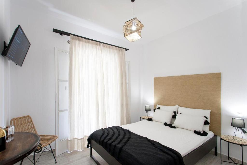 Postel nebo postele na pokoji v ubytování Alexia Studios