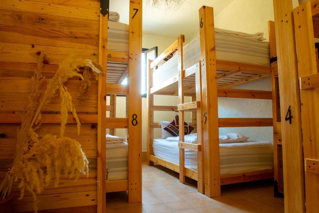 Postel nebo postele na pokoji v ubytování Anza surfhouse