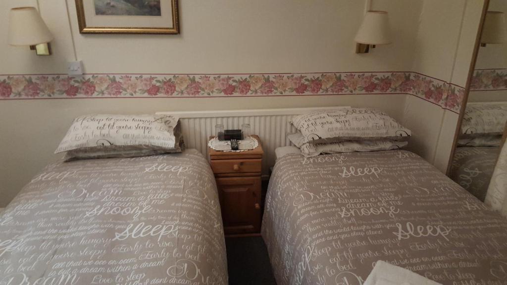 A bed or beds in a room at Star And Garter 