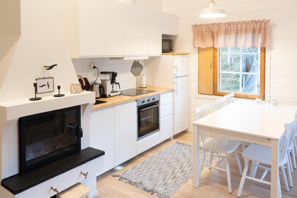 Kuchyň nebo kuchyňský kout v ubytování Hotel Ylläsrinne