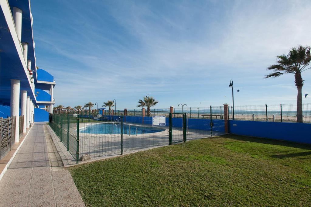Bazén v ubytování Livingtarifa Apartamento Guacamayo nebo v jeho okolí