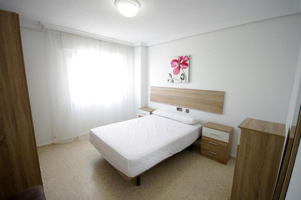 Postel nebo postele na pokoji v ubytování Livingtarifa Casa Del Mar