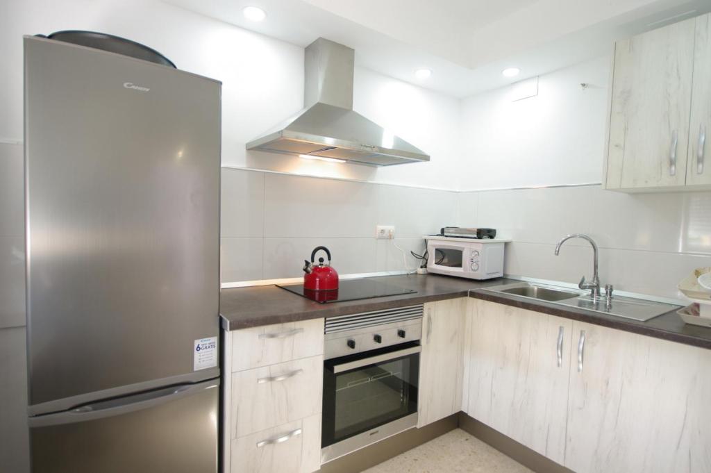 Kuchyň nebo kuchyňský kout v ubytování Livingtarifa Casa Del Mar