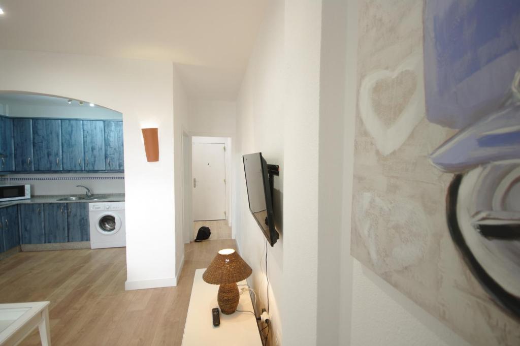 Kuchyň nebo kuchyňský kout v ubytování Livingtarifa Apartamento Agaporni