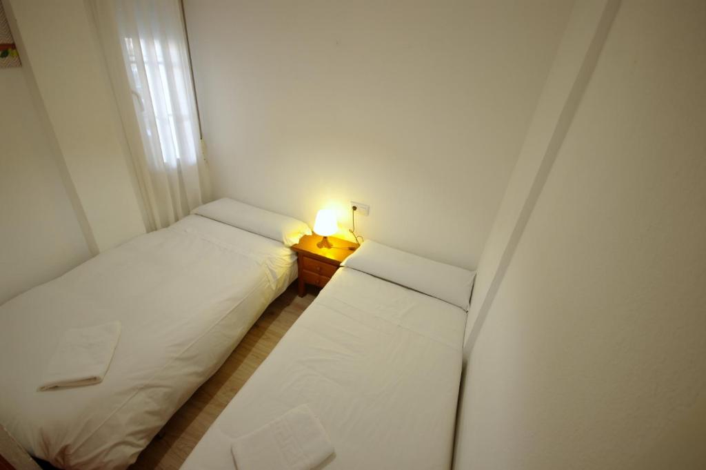 Postel nebo postele na pokoji v ubytování Livingtarifa Apartamento Agaporni