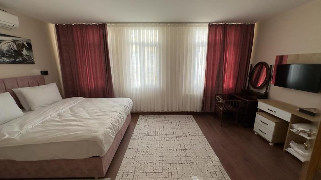 Postel nebo postele na pokoji v ubytování Albatros suite