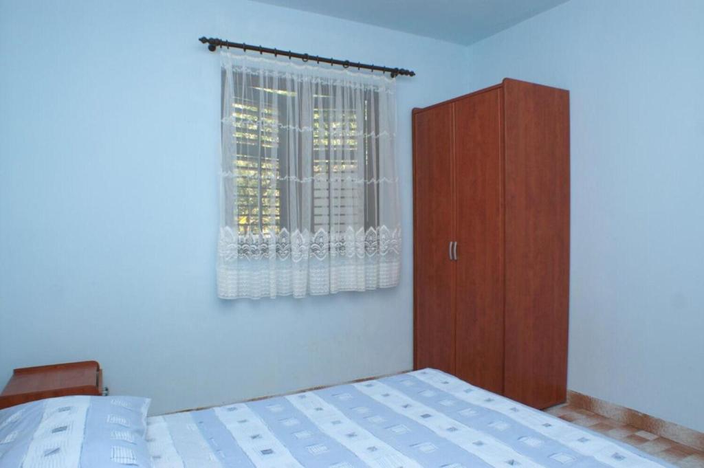 Posteľ alebo postele v izbe v ubytovaní Apartments Barry