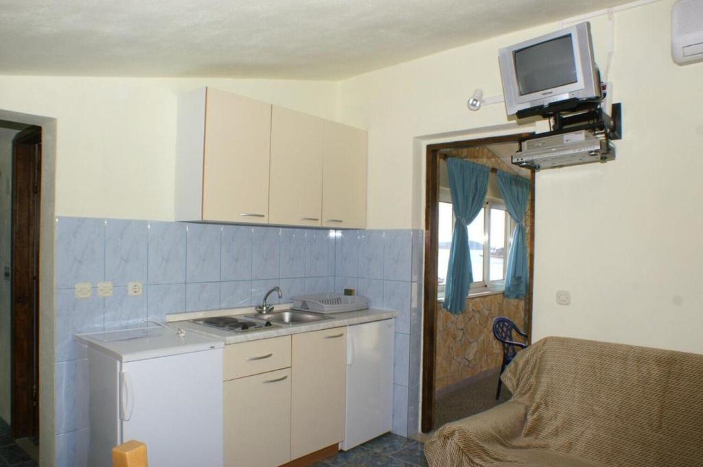Kuchyňa alebo kuchynka v ubytovaní Apartments Barry