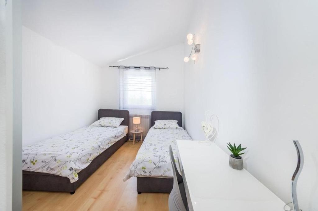 Posteľ alebo postele v izbe v ubytovaní House Luxury Villa with pool