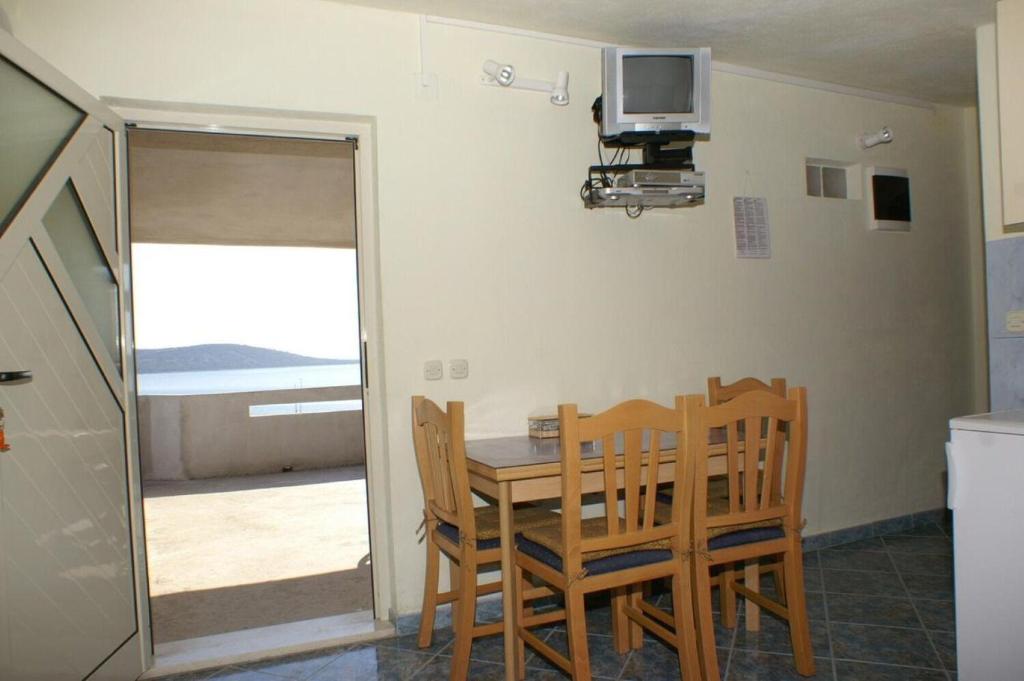 Televízia a/alebo spoločenská miestnosť v ubytovaní Apartments Barry
