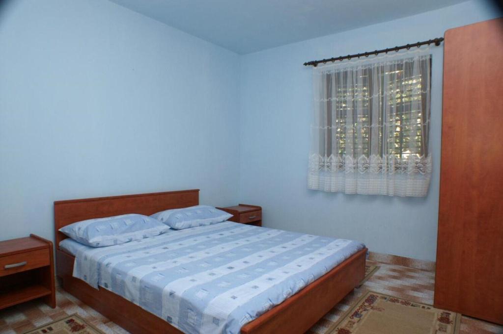 Posteľ alebo postele v izbe v ubytovaní Apartments Barry
