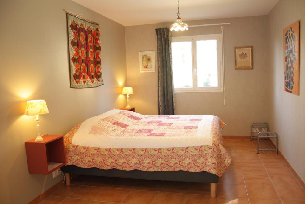 Postel nebo postele na pokoji v ubytování Repos chez Margot