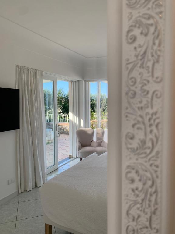 TV a/nebo společenská místnost v ubytování Bettola del Re home boutique b&b