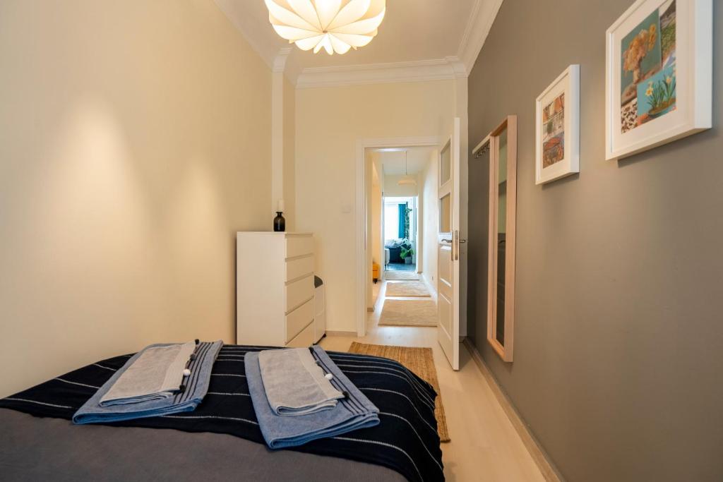 Postel nebo postele na pokoji v ubytování sevim suites Nişantaşı Center