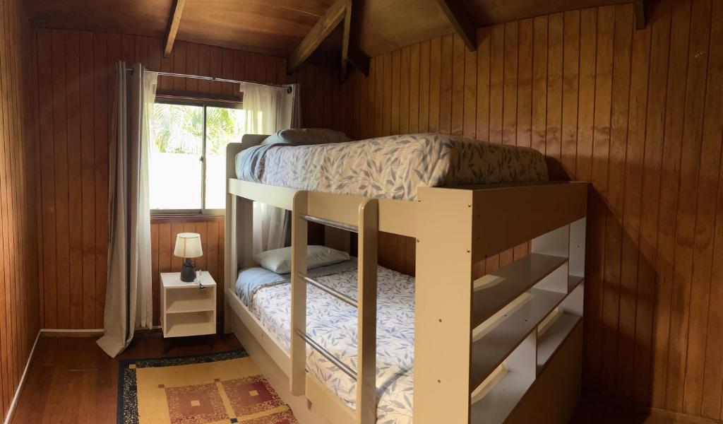 Cama o camas de una habitación en Cabañas Mahatua