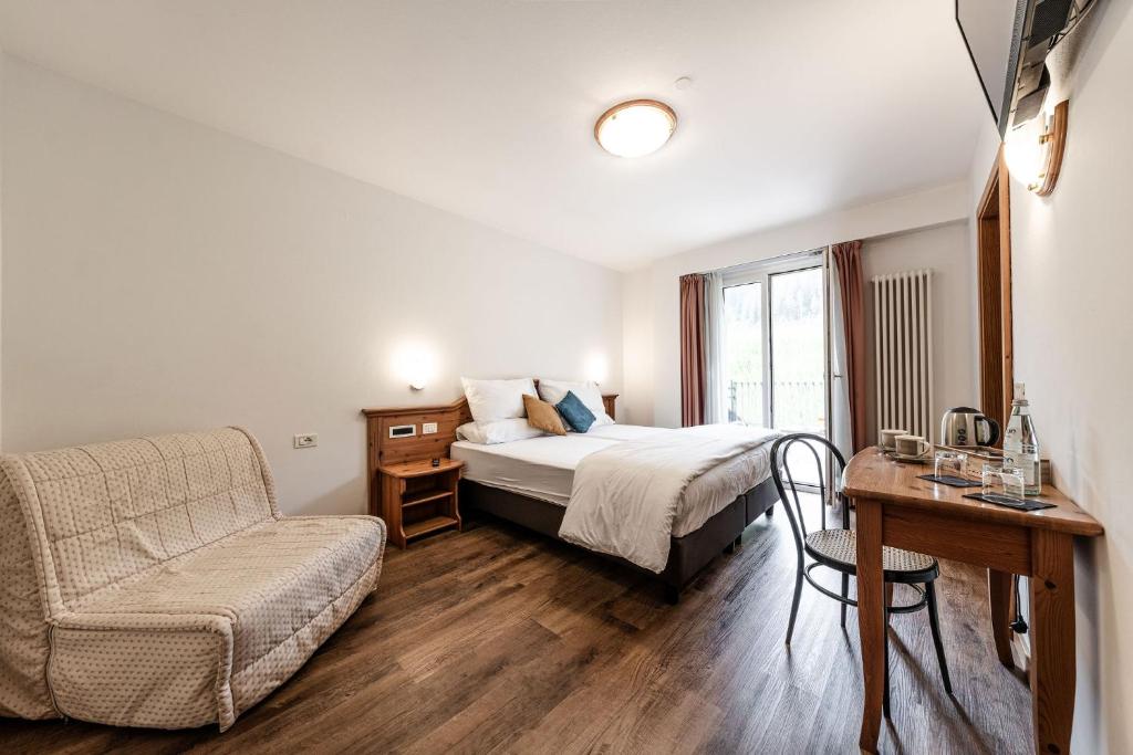 Postel nebo postele na pokoji v ubytování Hotel La Noria