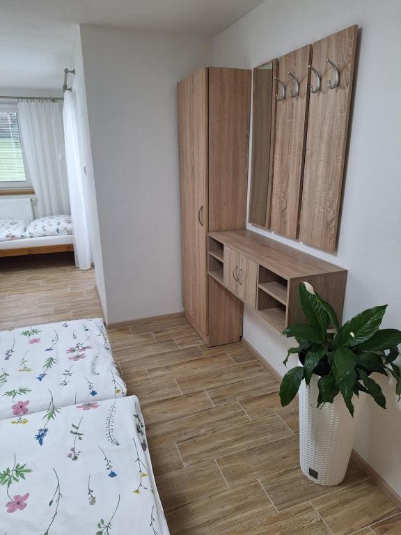 Postel nebo postele na pokoji v ubytování Ubytování U Křivánků 2
