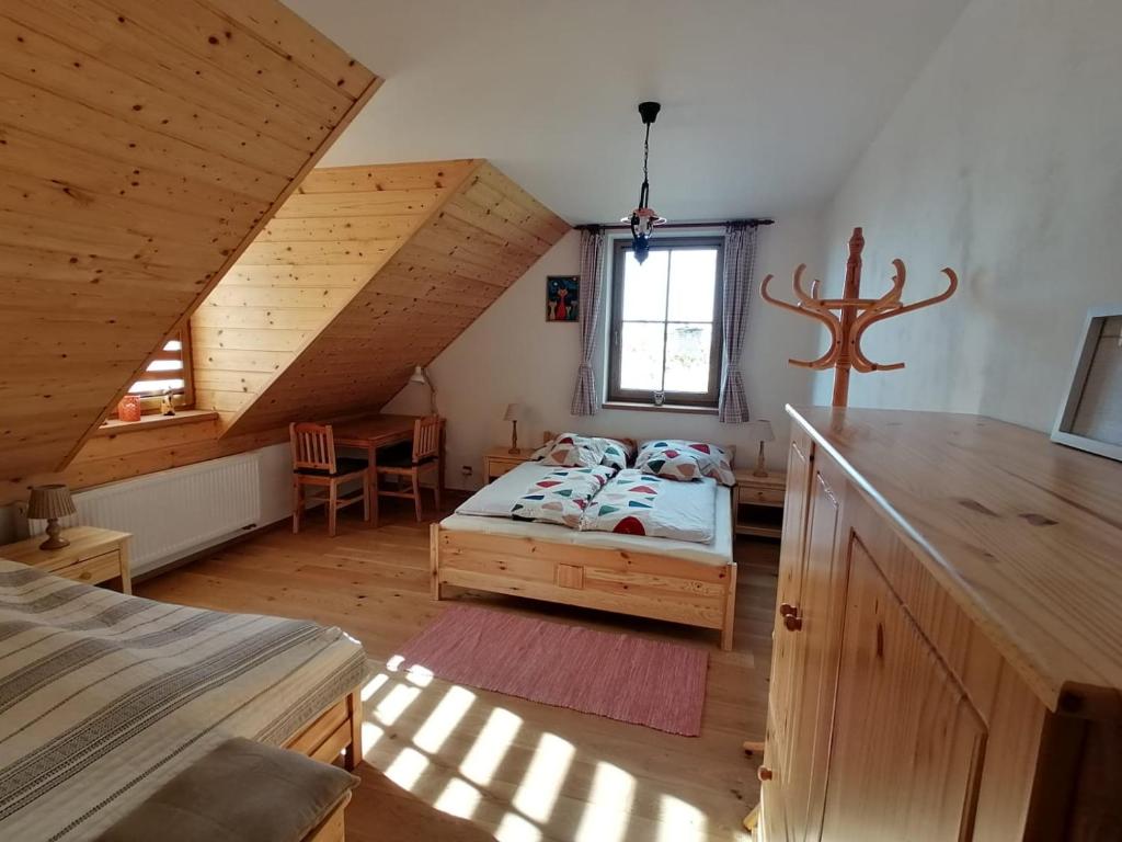 Postel nebo postele na pokoji v ubytování Chalupa U Maňouse