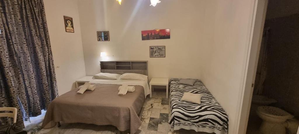 Posteľ alebo postele v izbe v ubytovaní Affittacamere Nilo