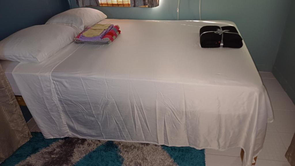 Postel nebo postele na pokoji v ubytování Rooster Run Guest House offers Vieques travelers newly furnished quaint affordable airconditioned rooms and only steps from the Ferry and nearby beaches