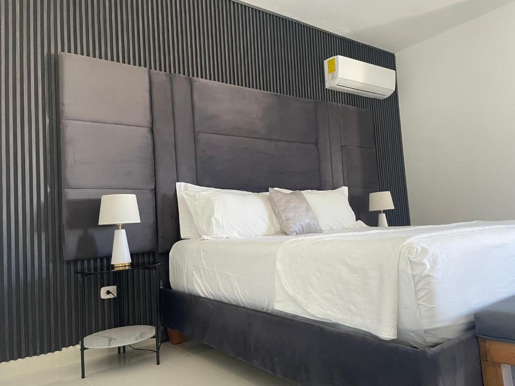 Postel nebo postele na pokoji v ubytování Gaia Residence Deluxe