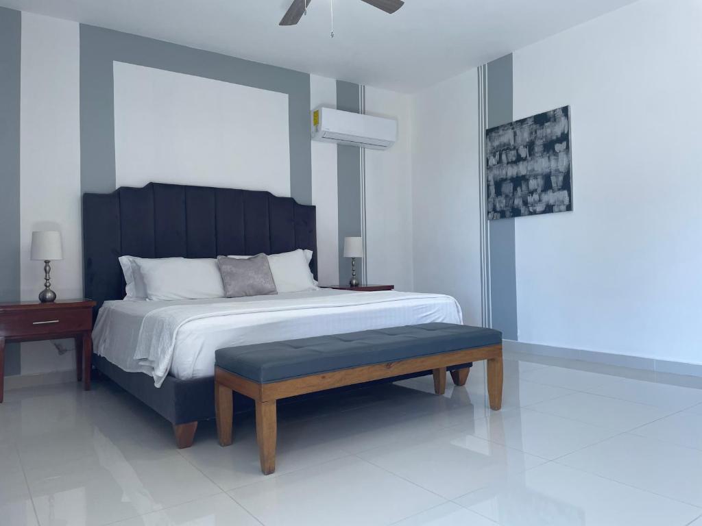 Postel nebo postele na pokoji v ubytování Gaia Residence Deluxe