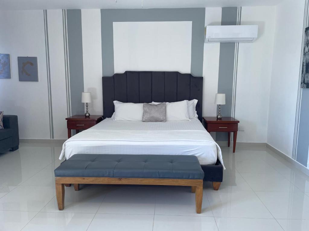 Postel nebo postele na pokoji v ubytování Gaia Residence Deluxe