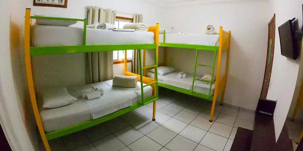 Postel nebo postele na pokoji v ubytování Che Lagarto Paraty