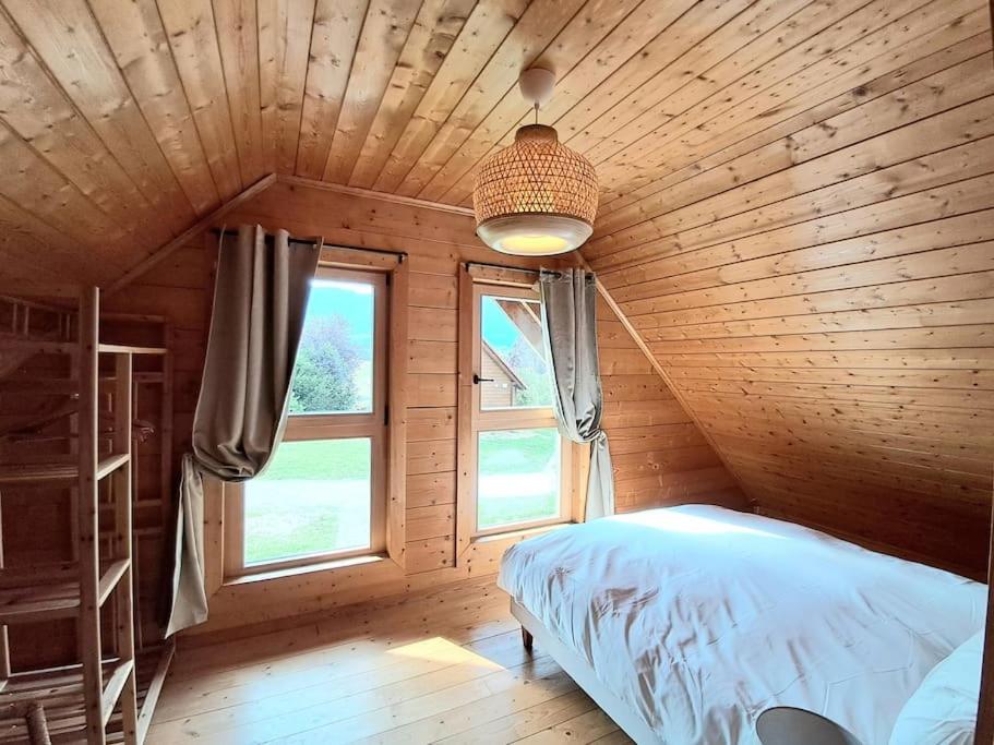 Postel nebo postele na pokoji v ubytování Domaine la Clairière