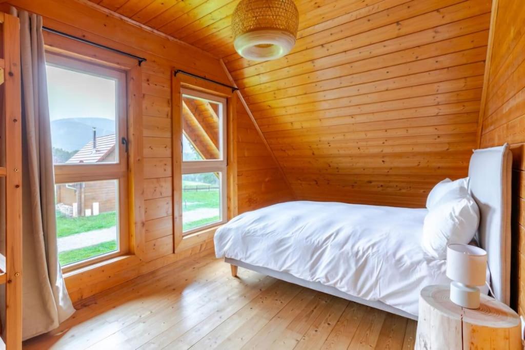 Postel nebo postele na pokoji v ubytování Domaine la Clairière