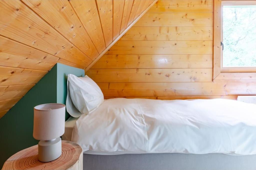Postel nebo postele na pokoji v ubytování Domaine la Clairière