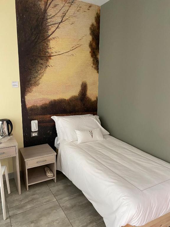 Postel nebo postele na pokoji v ubytování Volpedo hostel