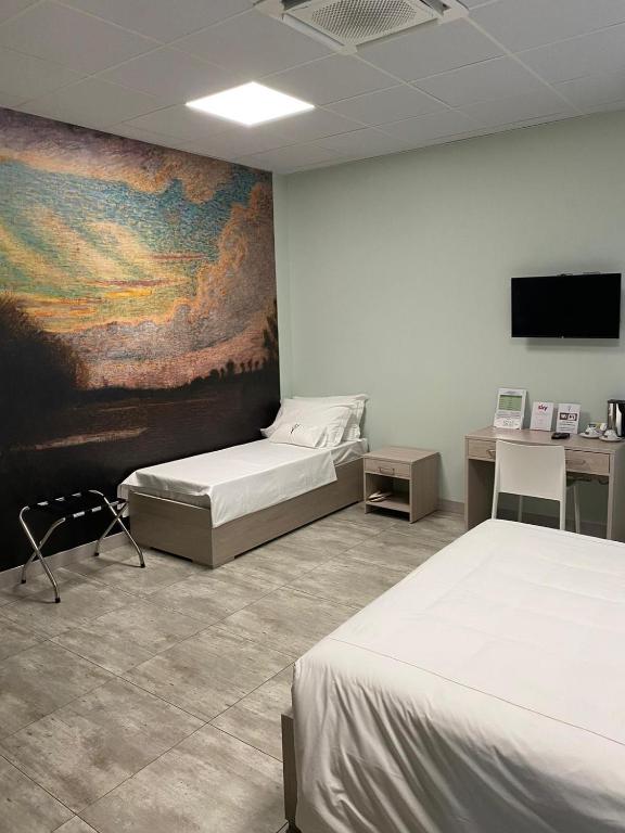Postel nebo postele na pokoji v ubytování Volpedo hostel
